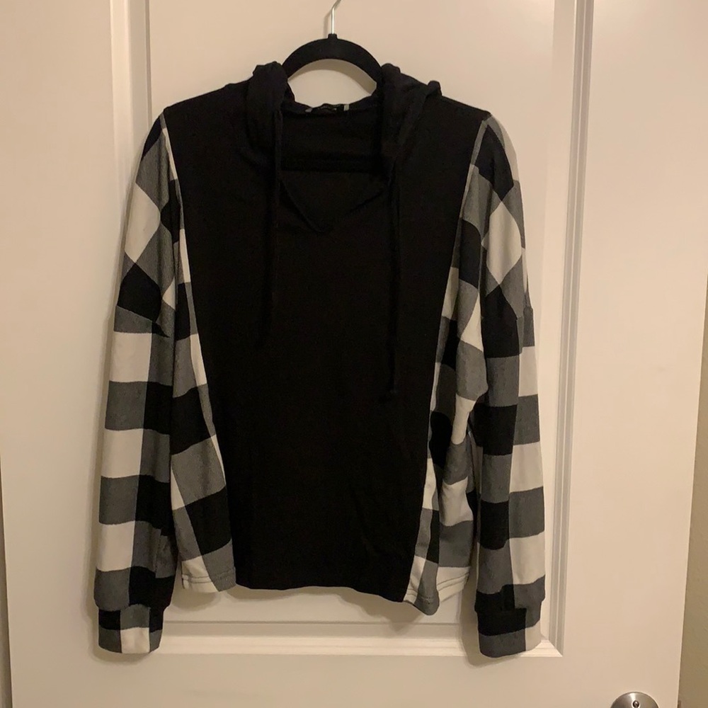 Black and white checkered hoodie size large.